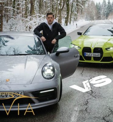 Porsche in silber und BMW M4 in gelb mit 2 Menschen